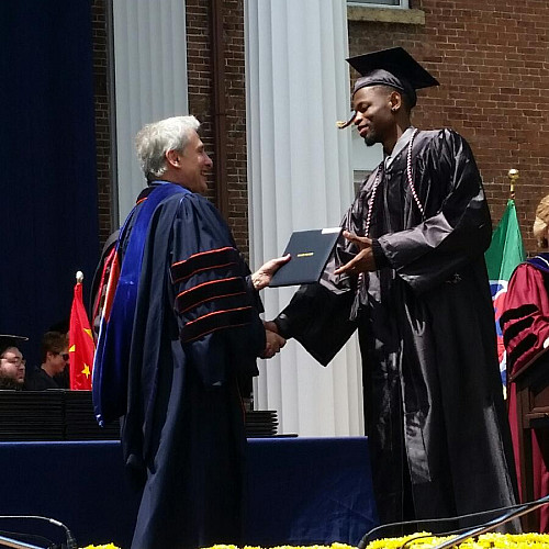 Steven receiving his diploma.