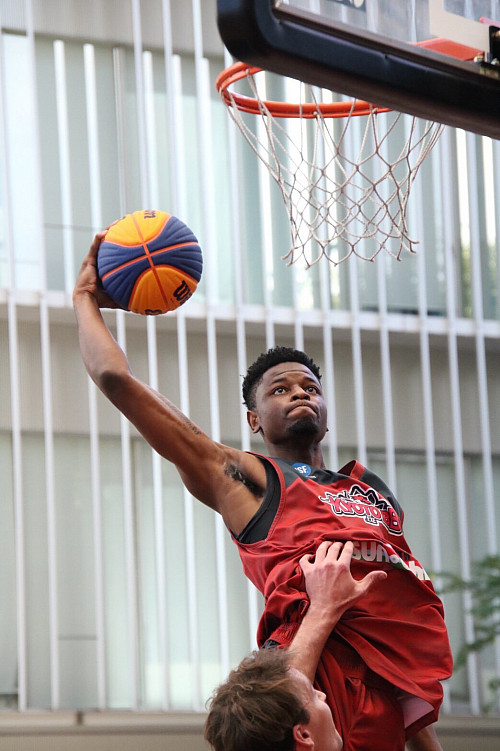 Steven playing basketball in Japan.
