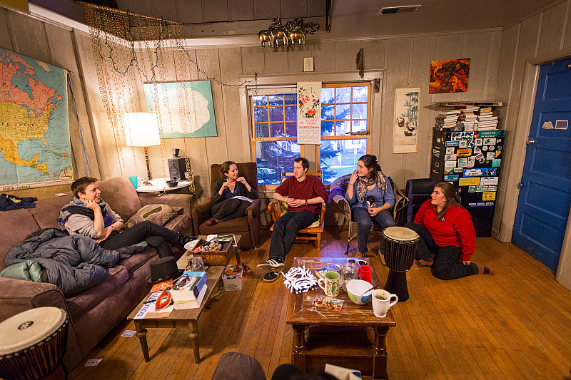 Students lounging in the Outdoor Environment Club house.