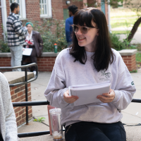 Students talk outside of Morse-Ingersoll Hall