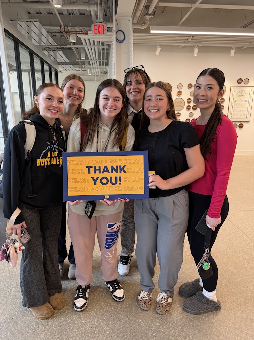 Students celebrate the Day of Giving's success.