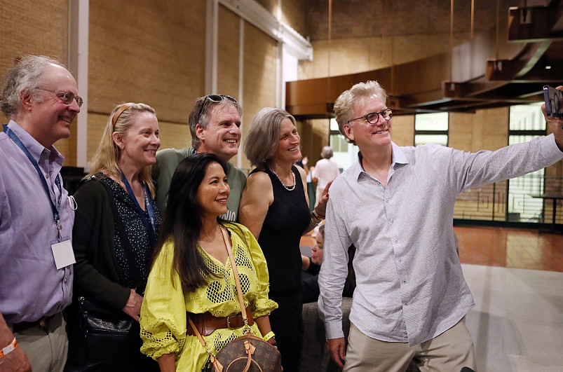 Alumni take a group selfie at the Powerhouse Bash.