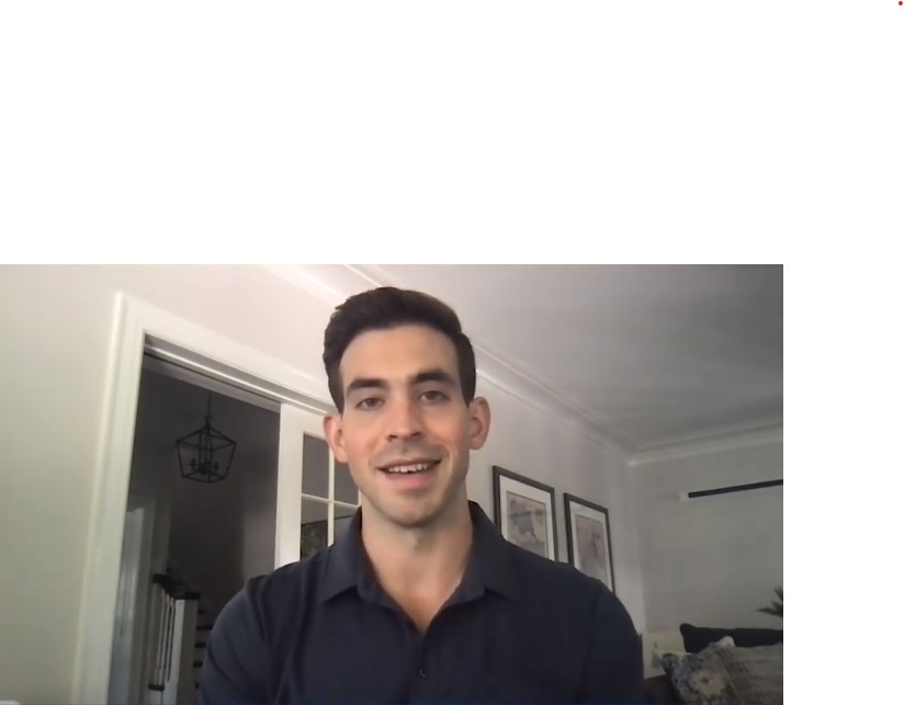 Joe Davis'10 accepting his 2020 Young Alumni Award from his home.