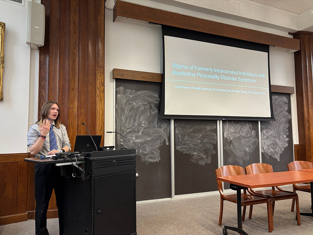 Levi Hansen '26 presents his work at Symposium Day.