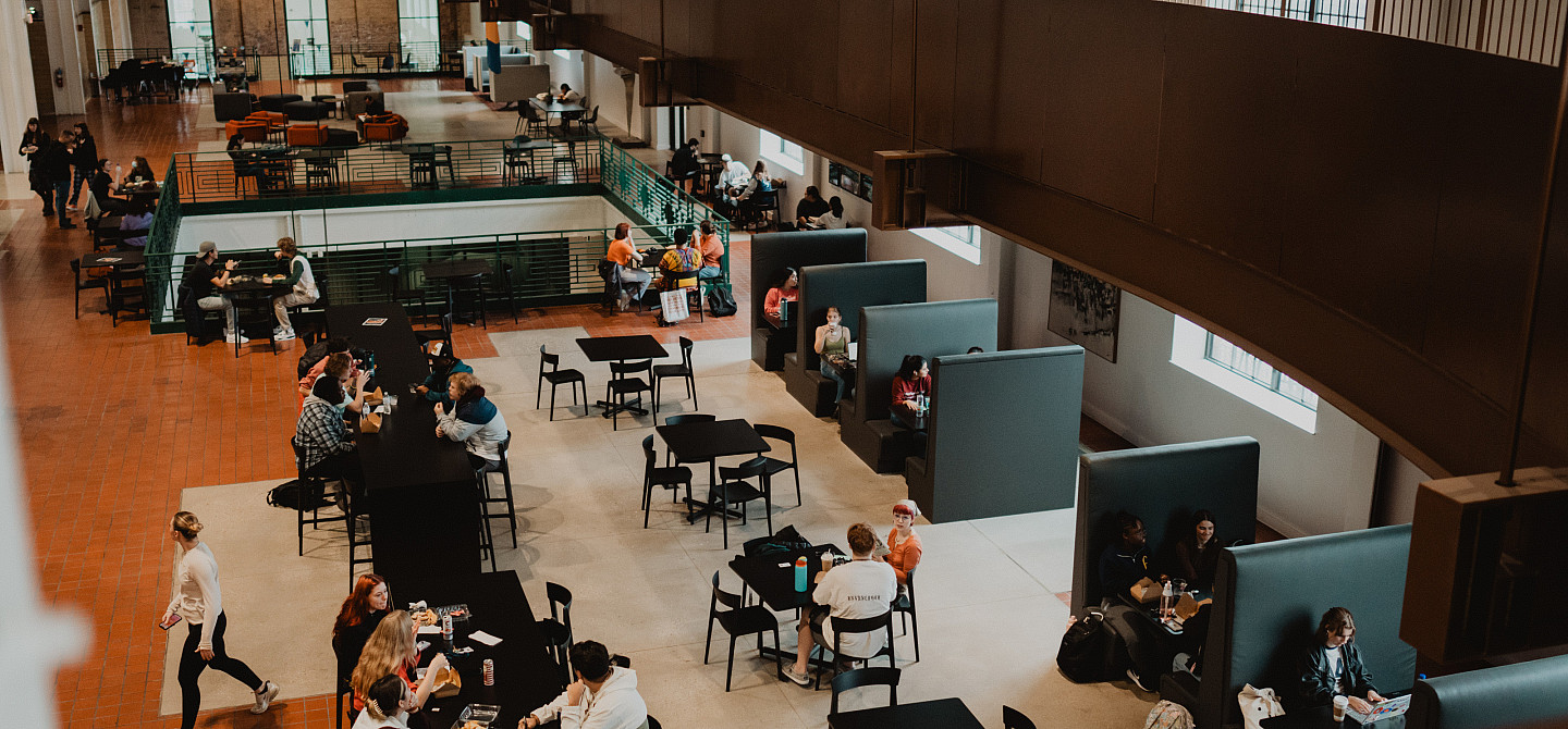 Students having lunch and studying in the Powerhouse.