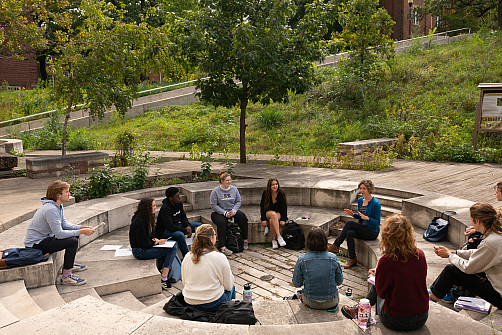 Student's enjoying class outside on the Sanger Science Center courtyard.