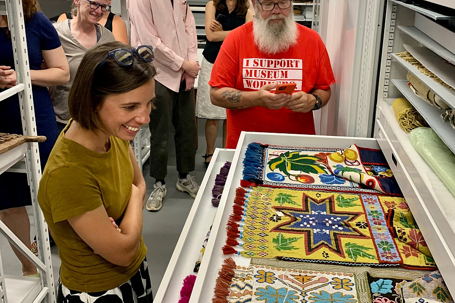 Matting and Framing works of Art on Paper participants touring Logan collections storage.