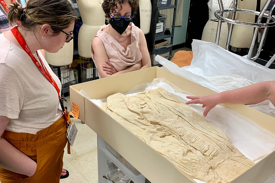 Introduction to Textile Conservation participants visiting the Beloit College Historic Costume Collection.