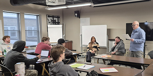 Brian Morello '85 introducing guests to his class.