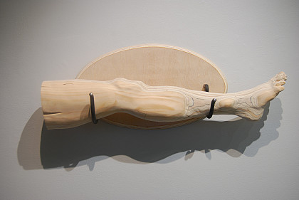 A wooden leg sculpture by Ellie Daniels '13.