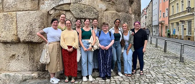 Students and faculty enjoying a day trip to Regensburg, Germany in 2024. Left to right: Assistant Professor Helen Werner, Chelsea Woletz ...
