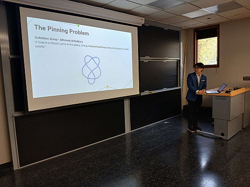 Ryan Pham '26 gives a talk at the University of Chicago about his summer research in topology and computer science with Prof. Ben Stucky