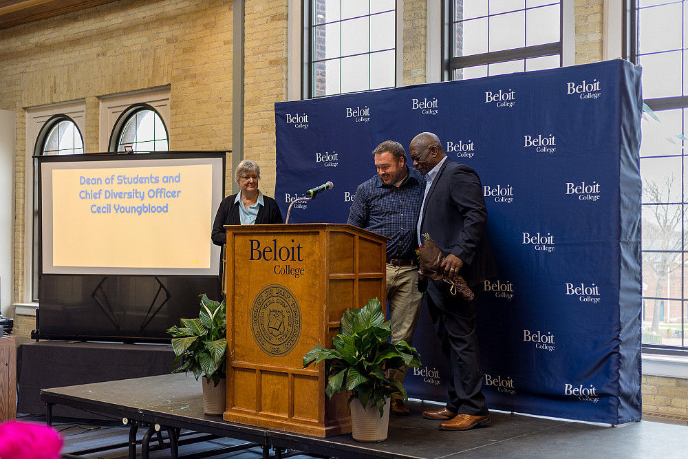 Kevin Schober and Cecil Youngblood share a hug during the 2025 Faculty Staff Recognition ceremony.