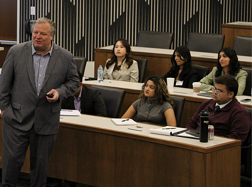 Students listen to industry professionals.