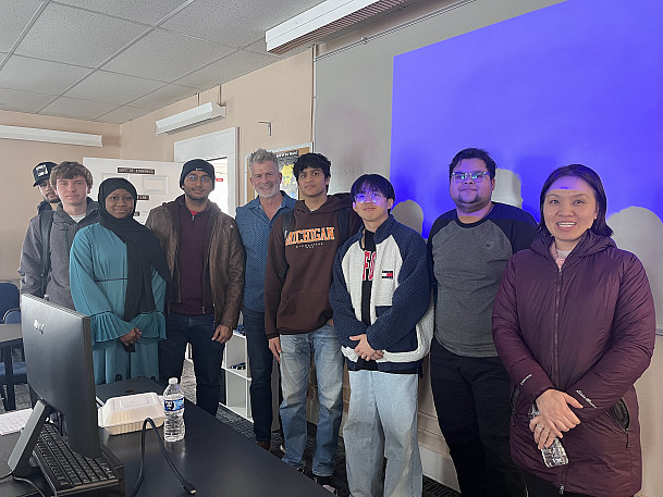 Larry Sullivan with Beloit College faculty members and students