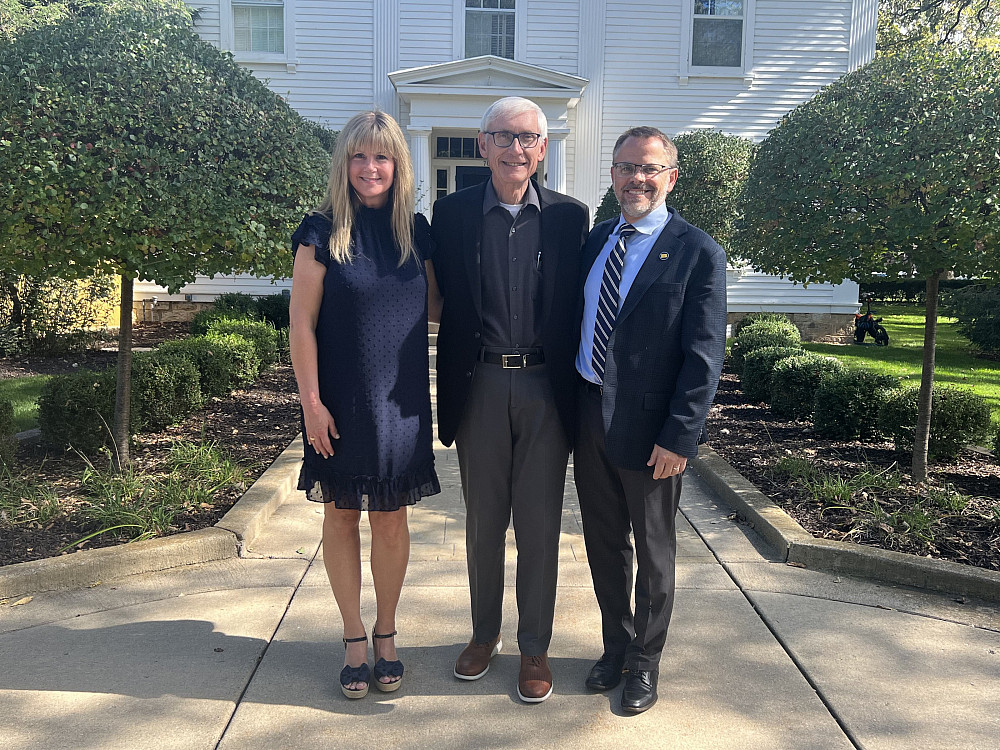 Gov. Tony with Eric and his wife