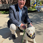 Greg Hanrahan with dog Jessie at Beloit College 2025 Graduation
