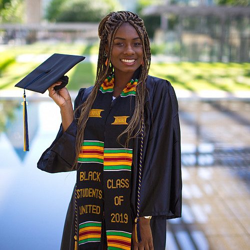 Kaela Evans19 appears in her Beloit graduation attire, including a stole for Black Students Unite...