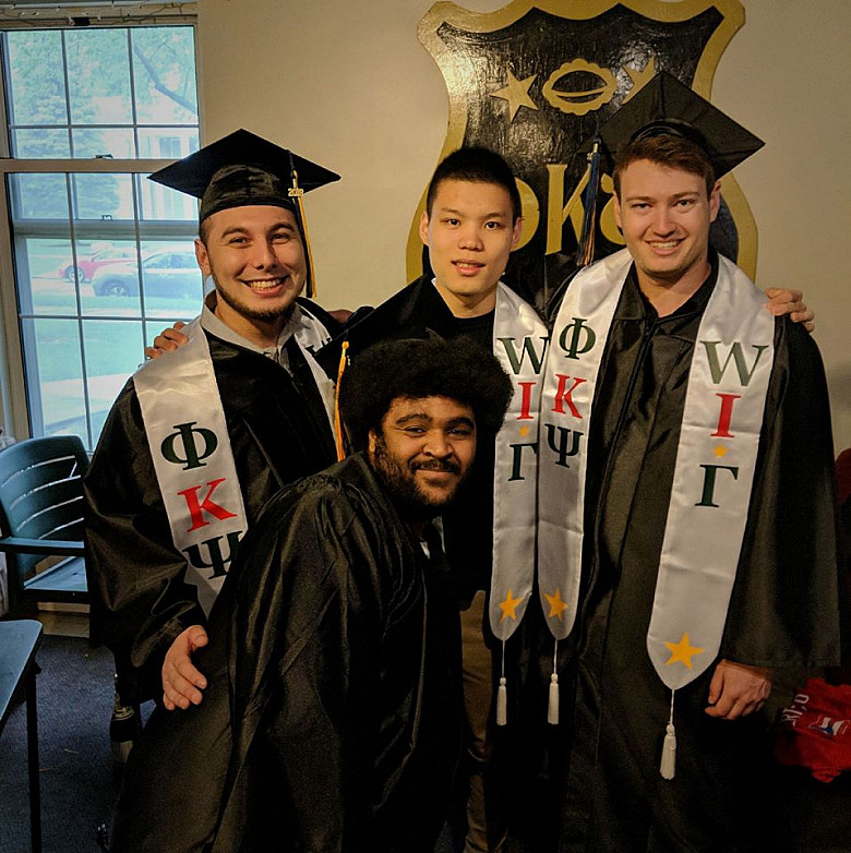 Johnny Li'20 (center top) with fellow fraternity brothers graduating from Beloit