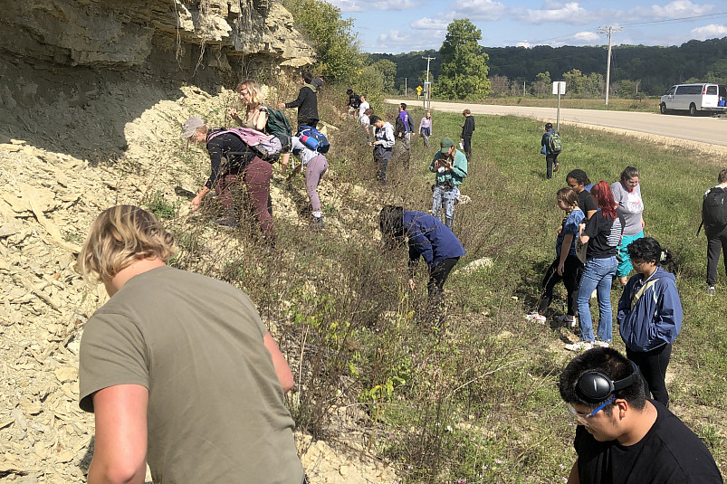 Students checking out Paleozoic outcrops