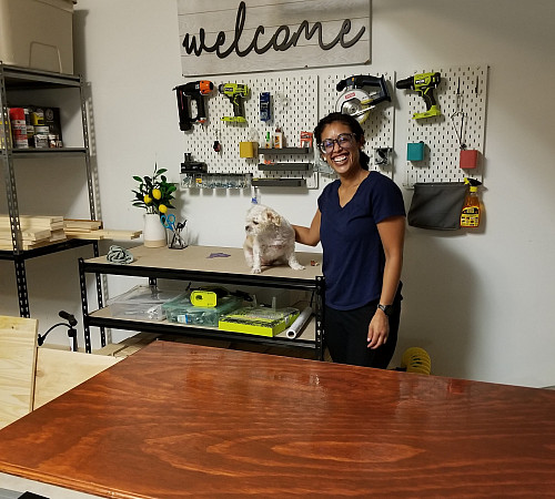 Lucia Peralta'12 in a woodworking studio