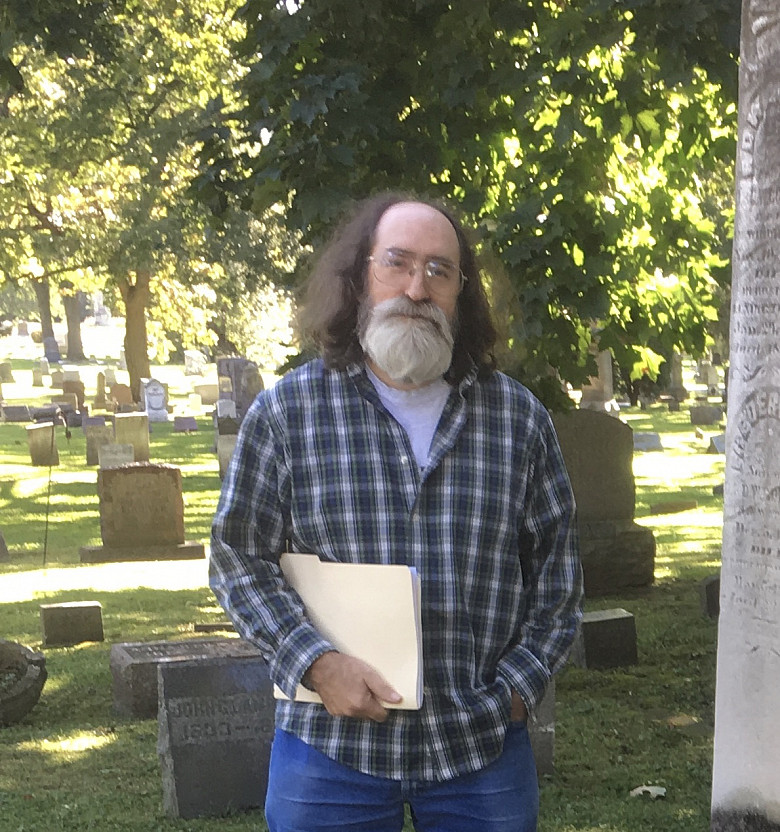 Fred Burwell guides a History class around Oakwood Cemetery in Beloit