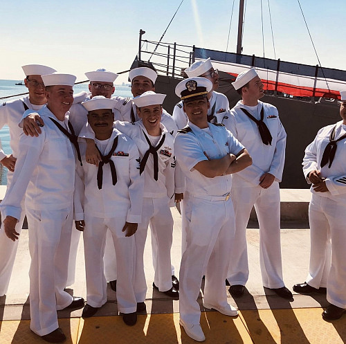 Carlos de Cordoba'11 with his division aboard the DEXTROUS during a change of command ceremony