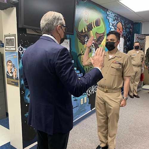 Carlos de Cordoba'11 promotion to Lt. With the Honorable Mr. John Feeley, former U.S. Ambassador to Panama