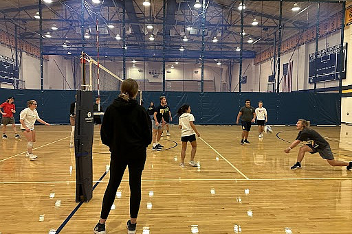 Students playing Intramural Volleyball