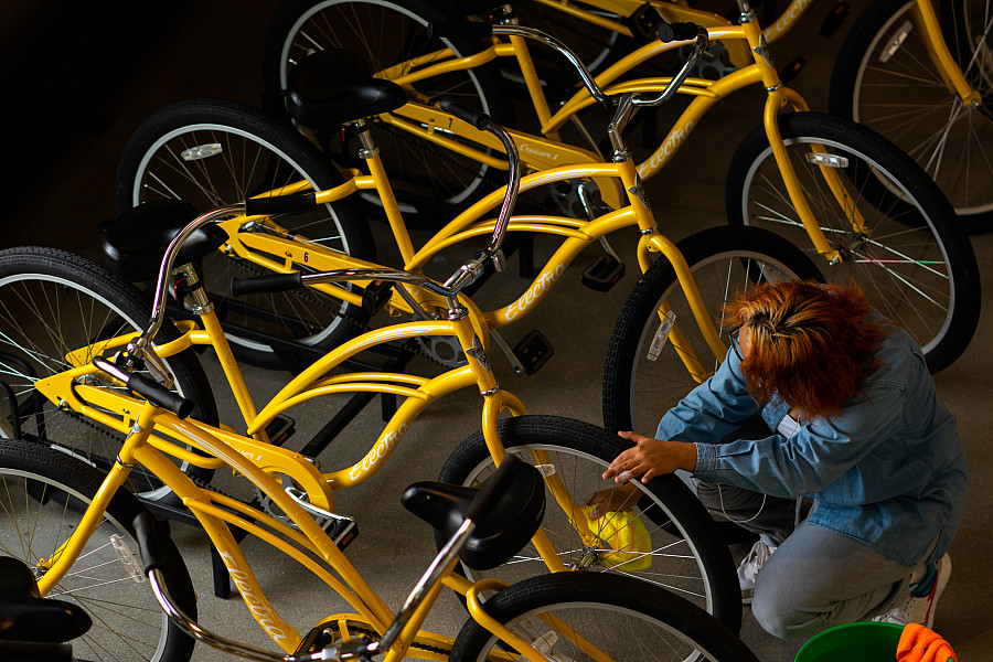 Student maintaining Sinnissippi Cruisers bikes, our bike share program.