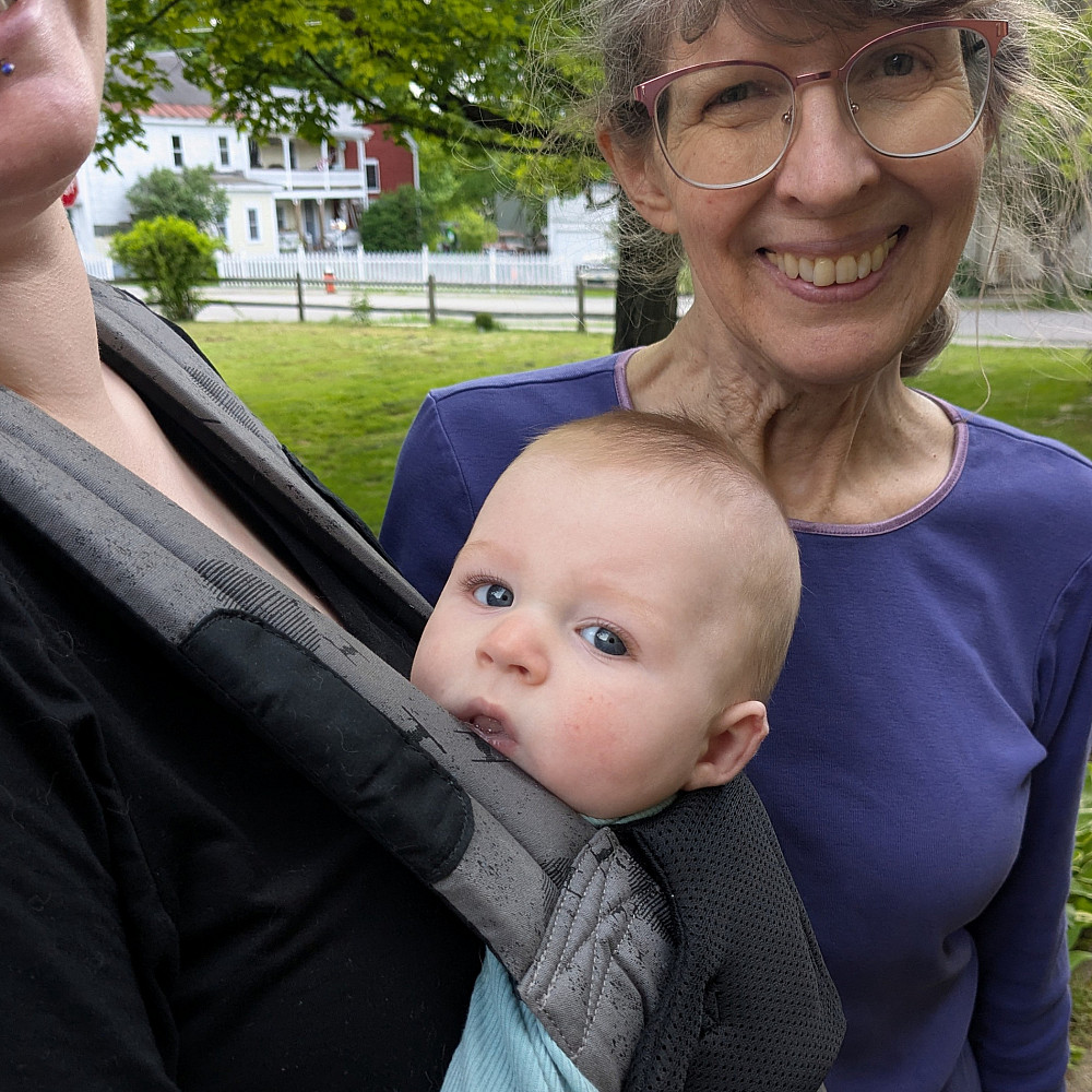 Dot Stoops Mason '72 with her grandson.