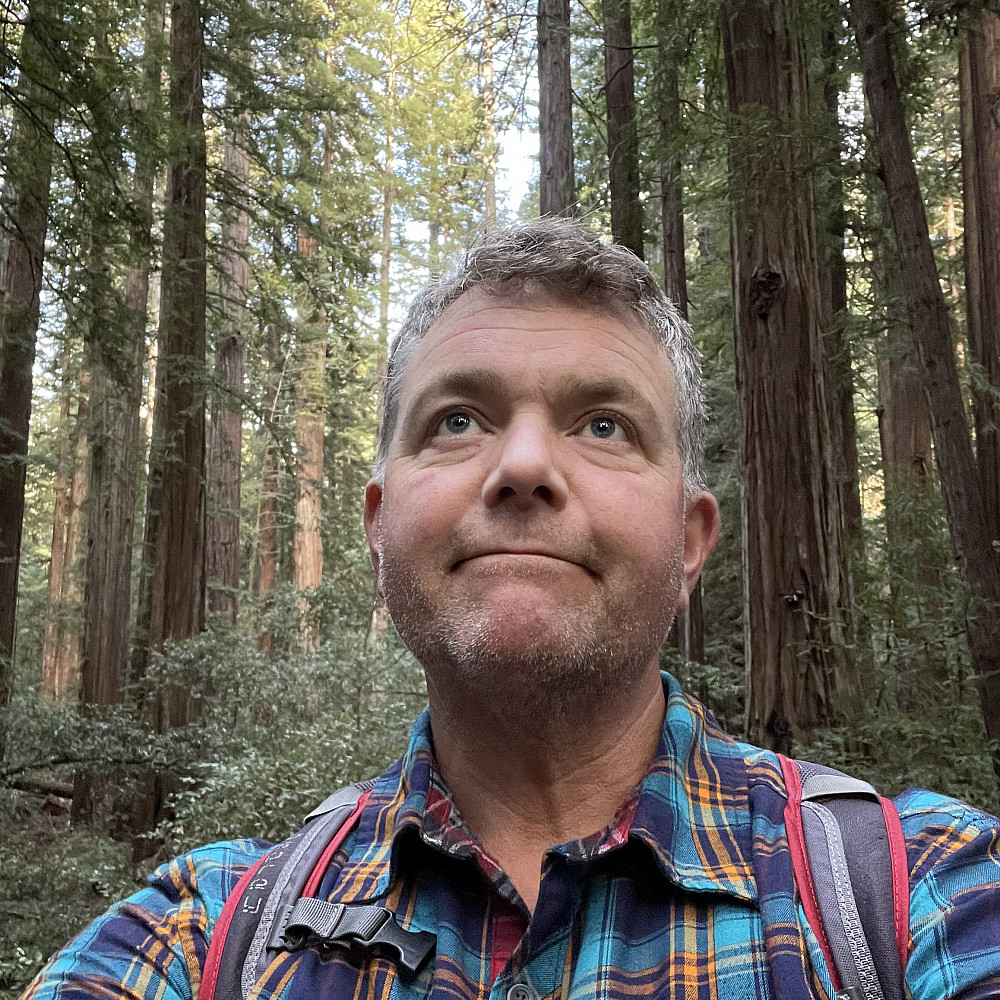 Adam Bassler'99 Adam Bassler'99 in the forest.