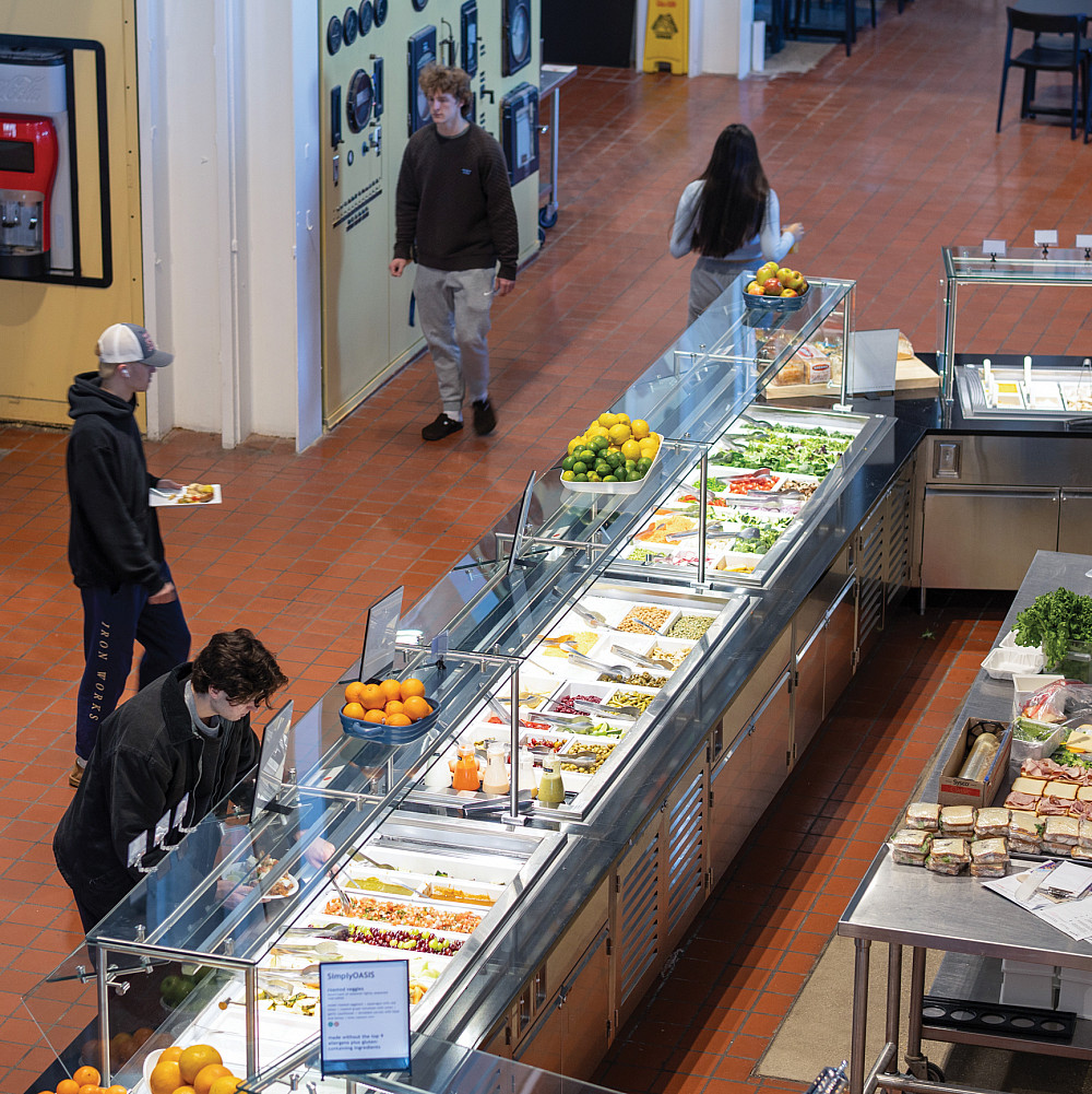 Students walking past the salad and fruit buffets at Hamiltons.