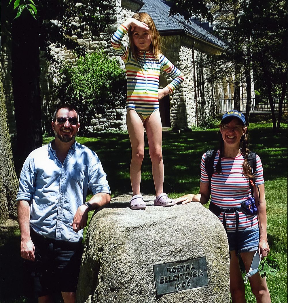 James Burling'07 and Laura Damon-Moore'08 of Madison, Wis., are shown with their daughter, Lilly, at the Rostra Beloitensia rock near Eat...