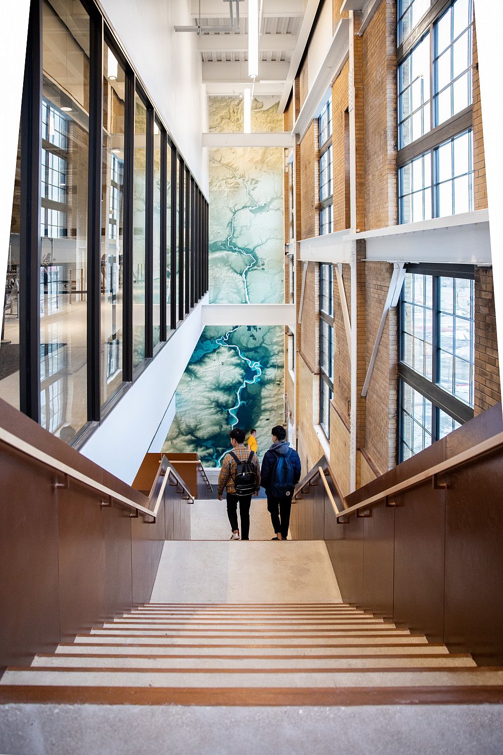 Sense of place. A large-scale mural of the Rock River Valley, created by Scott Reinhard, greets students after they enter the building th...