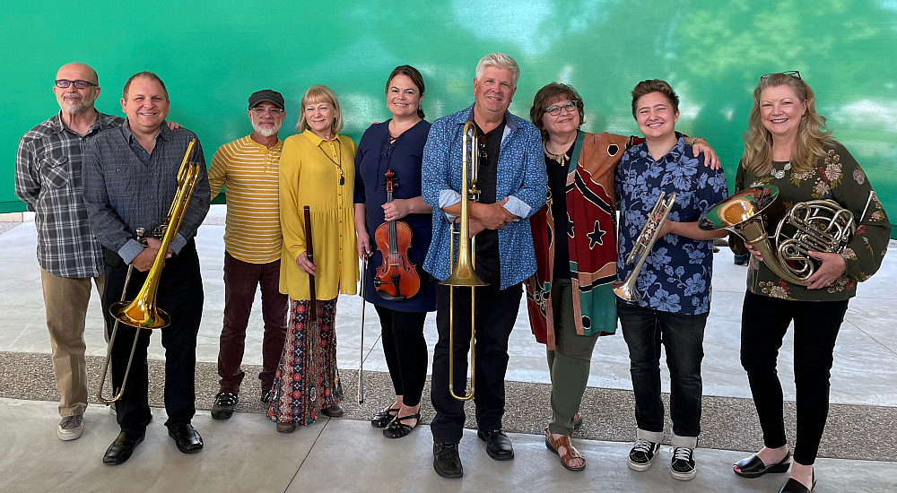 Laura (Laurie) MacKenzie'74, shown fourth from the left with her Celtic big band Brass Lassie, has enjoyed a diverse, full-time musical c...