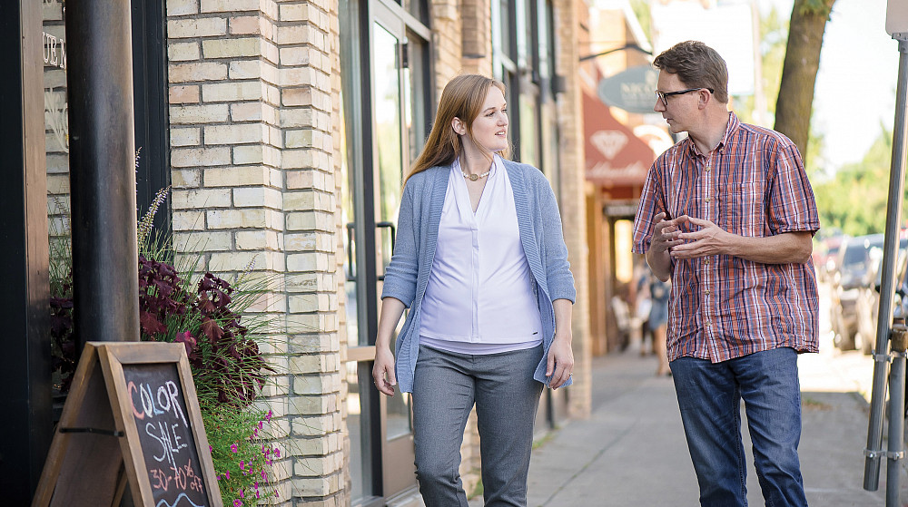 Sara Yacoub, a candidate for Wisconsin's 30th Assembly District seat, consults with Zak Williams'97 in Hudson, Wisconsin.
