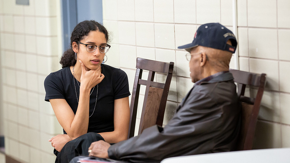 Eva Laun-Smith'21 visits with Walter Knight at the History Harvest event. Knight, a civic leader who came to Beloit from Arkansas as a yo...