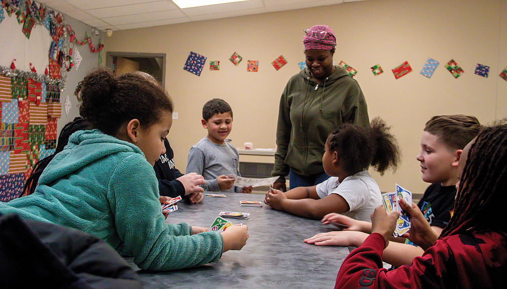 Shakira Wilson'24 supervises a craft project with children at Merrill Community Center.