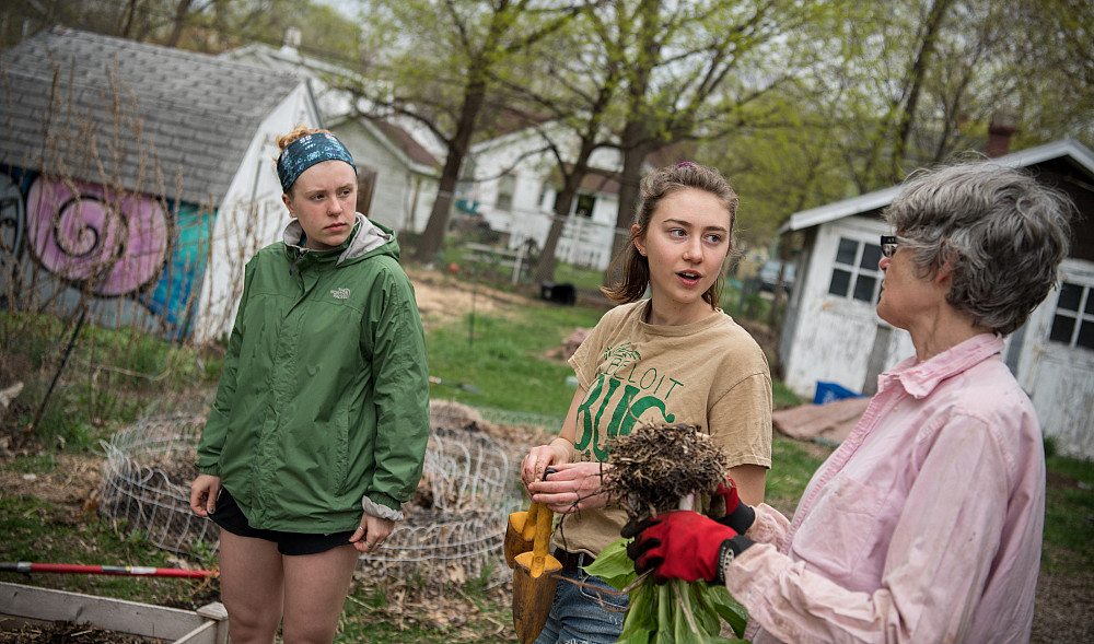 Garden advisor Betsy Brewer talks with Natalie Dusek'19, left, and Christina Shonnard'19 in the garden last spring. Student volunteers tu...