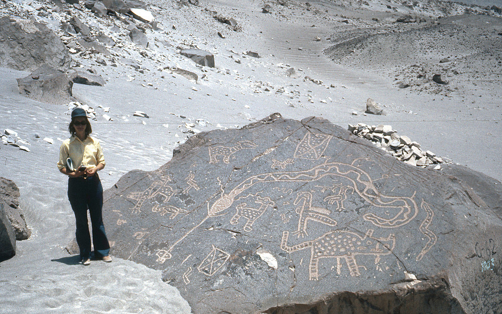 Betsy Murray '77 surveys one of the thousands of petroglyphs at Toro Muerto, in the arid coastal region of Peru, 1974.
