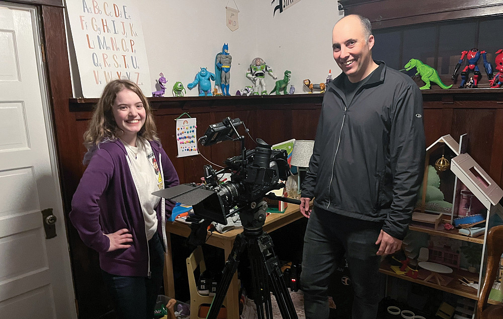 Allison Overcamp '25 and Joe Bookman together with a film camera.