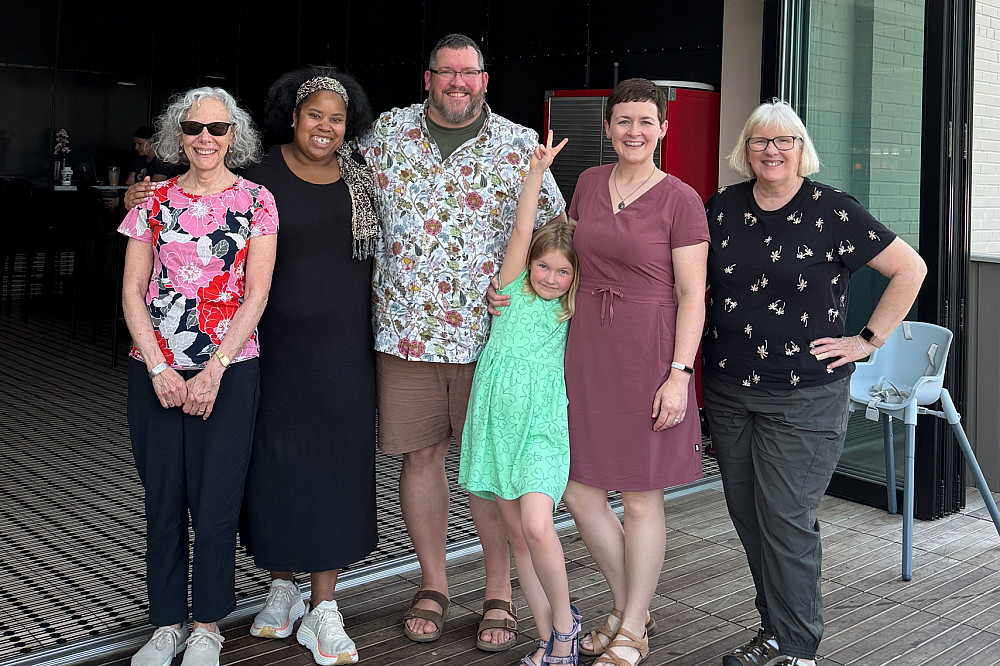 Friends and family with Greg Rankin '08 at his graduation ceremony.