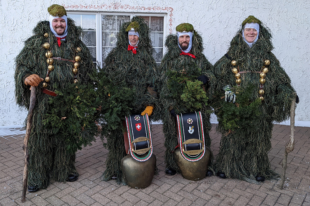 Chlaüse ready to don their masks and begin their bell ringing and yodeling through town.