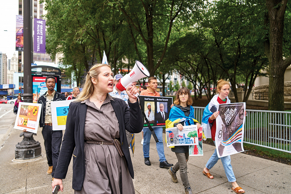 Anastasia Voronovsky'21 leads activists at a rally in Chicago protesting the invasion of Ukraine.