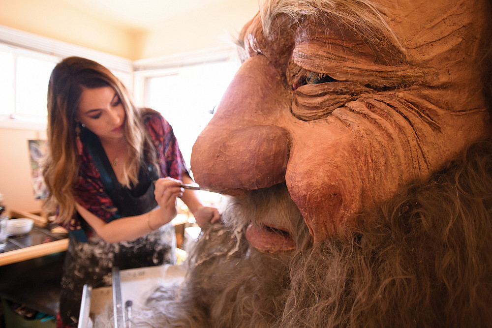 Puppet - Skin Sofia Hernandez Crade'13 works on coloring the beard of the 24-foot-tall puppet.