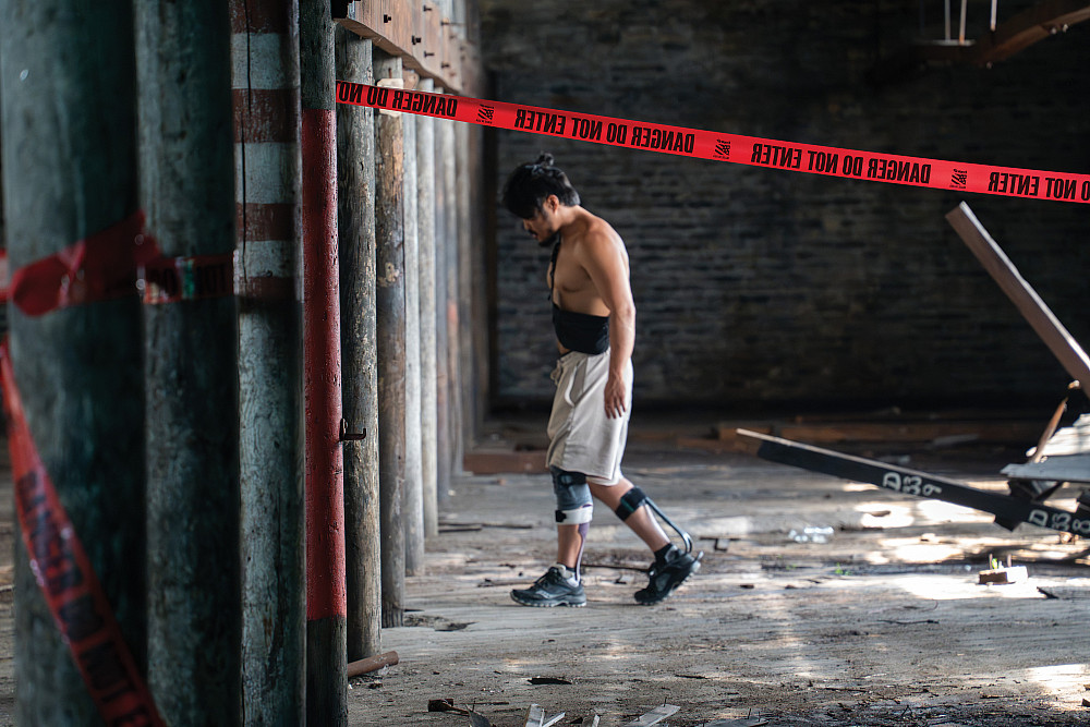 Nathan Sill'23 contemplates an obstacle in an undisclosed location.