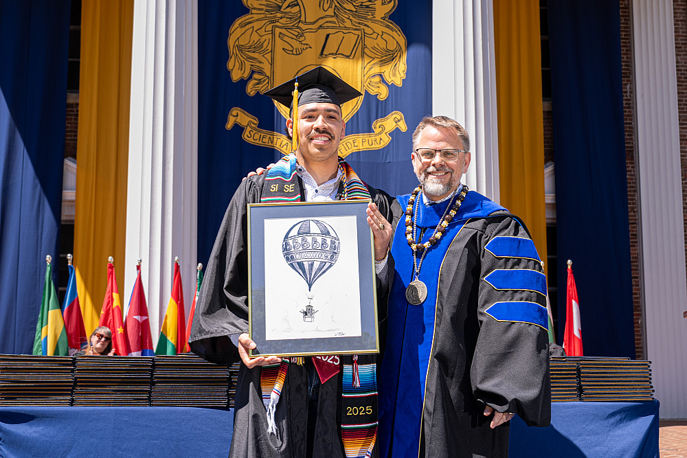 Rafael Cervantes Jr. '25 receiving the Warren Miller Blue Skies Award.