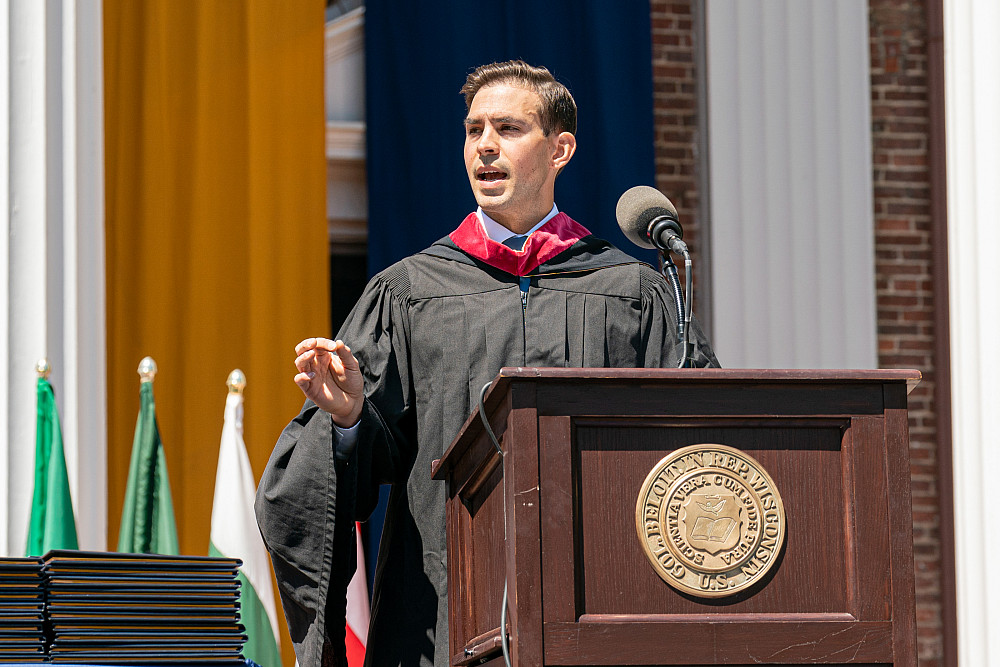 Commencement speaker Joe Davis '10 speaking to the Class of 2025.