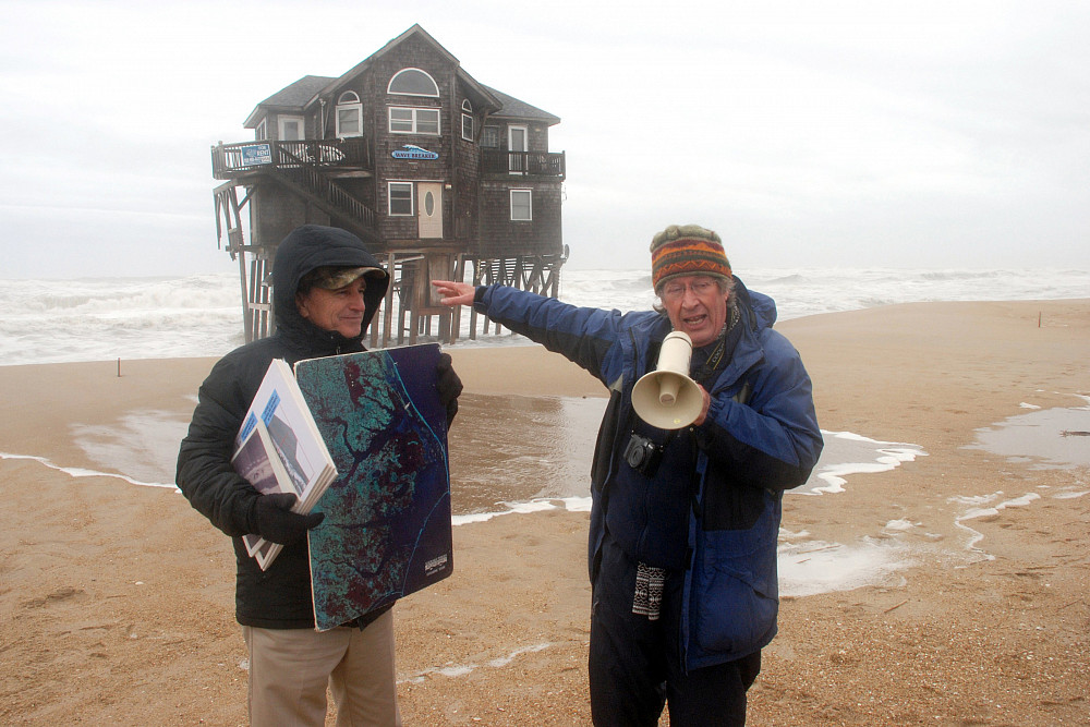 In 2014, Riggs, right, and a colleague explain nor'easter storm dynamics and barrier island recession. This oceanfront house called ...